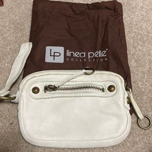 Used once, LINEA PELLE collection.Thick pebble distressed leather wristlet.